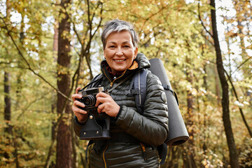 Enjoying nature while capturing memories during a forest hike