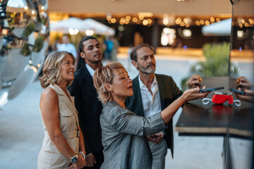 Businesspeople using interactive display in modern environment