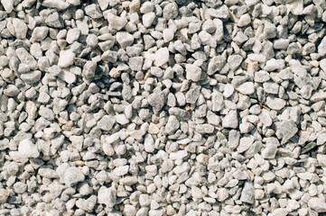 Gravel texture, stones background. Rocks pattern