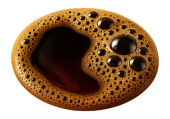 Bubbles forming on the surface of a freshly brewed coffee