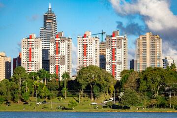Curitiba, capital and largest city in the state of Parana in Southern Brazil. Showcasing the modern cityscape blending with the natural beauty of a public municipal Barigui Park.