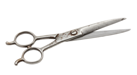 vintage barber scissors isolated on white.