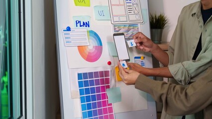 Hands-on UI Planning. Team collaborating on a design project.