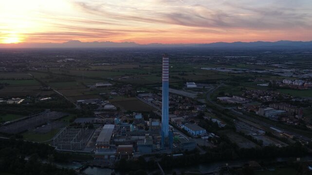 Thermoelectric power plant, generation thermal energy and electric energy generation. 848 megawatts. Italy. Aerial drone video.
