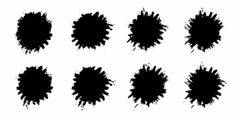 Eight black ink splatter brush strokes isolated on white background for creative design elements