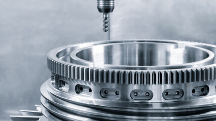 Large metal turbine on table of industrial metalworking programmable CNC machine, industrial...