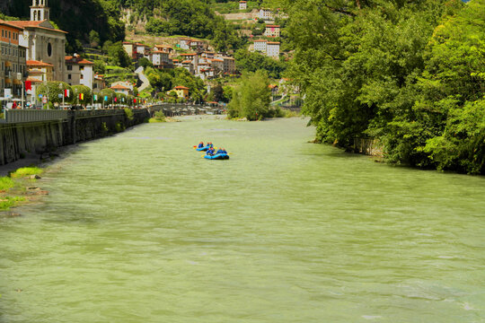 View of the Brenta River in Valstagna with two rafting boats, Vicenza, Italy.