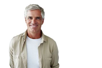 Confident middle-aged man with silver hair smiling warmly, wearing casual clothing in a bright and inviting indoor setting, promoting happiness and positivity