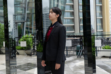Asian business woman on the top roof