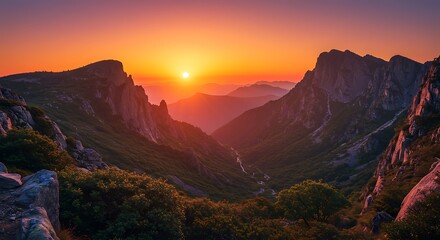 Vibrant mountain landscape under orange sun, natural beauty