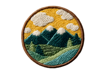 Oval embroidered landscape of mountains and clouds