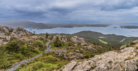 Stone Sherpa Pathway in a Forested Landscape with Lush Greenery, Siggjo, Norway