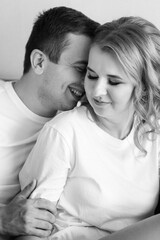 young couple bride and groom in the morning in a hotel room
