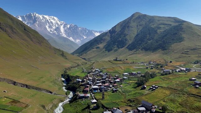 Picturesque View of Ushguli, a Community High in the Caucasus Mountains, Showcasing Its Unique Svan Towers and Traditional Architecture.