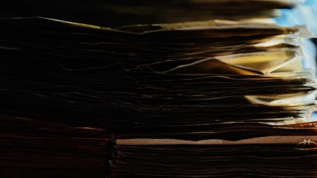 Abstract close-up of euro stacks partially hidden in shadow, evoking secrecy