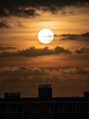 Sunset over rooftops urban landscape photography evening sky silhouetted buildings tranquil atmosphere
