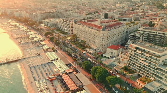 High angle view of a Cannes city located at seashore during sunset in France.