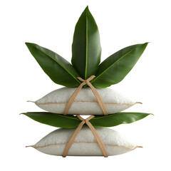 Steamed rice dumpling wrapped in large green leaf with natural twine, stacked and fresh