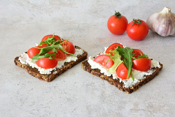 Cottage Cheese Toast with Fresh tomato slices and arugula healthy snack