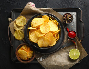 Crispy potato chips served in bowl