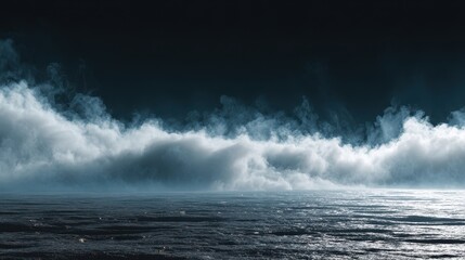 Ethereal white fog bank hovering over a dark ocean under a black night sky.