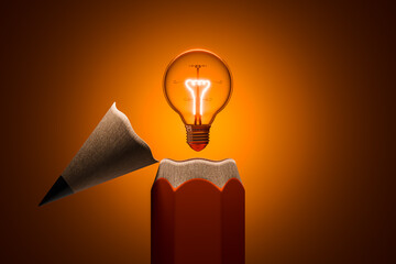 An orange pencil with its tip opened to reveal a light bulb inside represents ideas, thoughts, goals, learning, success, and leadership.