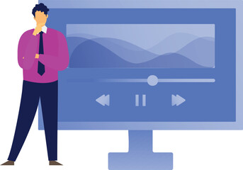 Businessman playing video on monitor