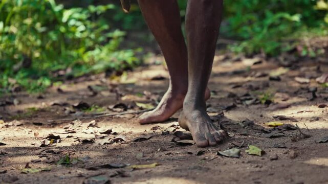 Vedda tribesman of Sri Lanka dancing a ritual dance before hunting, traditional lifestyle, and connection to nature. Tribal portrait in native Habitat 120 fps slow motion. 02.03.2022 SRI LANKA