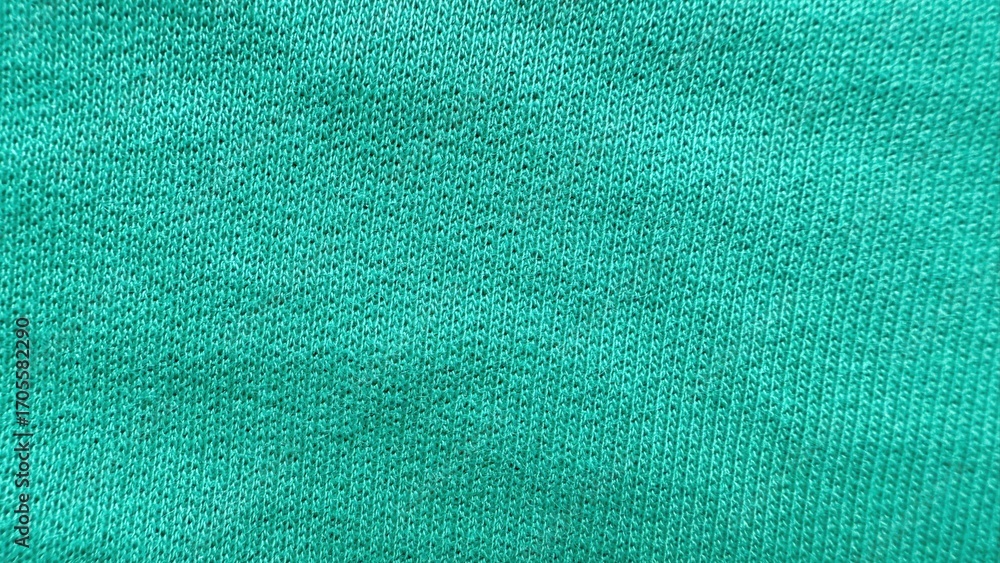 Poster close-up of vibrant turquoise knit fabric texture with intricate stitching ideal for background or t