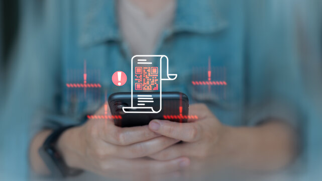 Person holding smartphone with QR code receipt and warning alert icon, representing online payment error, digital fraud, scam risk, cybersecurity threat, and financial transaction problem.