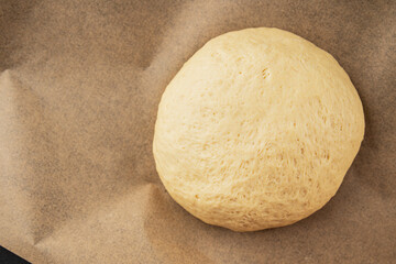 Dough raw cooking yeast, flour, water tasty snack fresh delicious gourmet food background on the table rustic food top view copy space