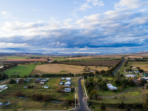 Aerial view road leading out of the country town of Merriwa in New South Wales Australia