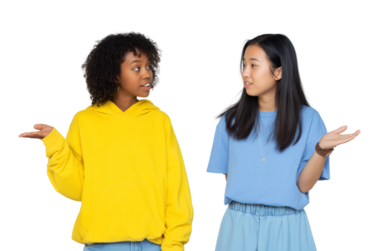 Two teenage girls talking with questioning gestures