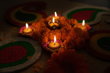 Diwali Festival. Traditional oil lamps and marigold flowers creating a festive ambiance.