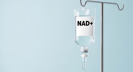 Clear fluid bag with N A D plus label on stand intravenous drip