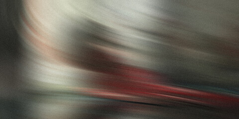 Abstract streaks of red and grey paint swirl across a textured, grainy surface, creating a dynamic...