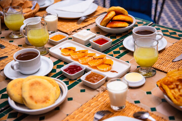 Traditional breakfast in Morocco with oranges and arabic bread