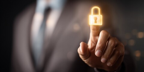 Businessman in a suit touching a glowing digital padlock icon, symbolizing cybersecurity, data protection, privacy and secure access in modern business technology.
