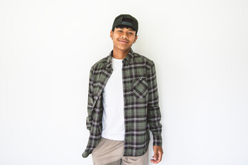 portrait young handsome thai boy isolated on studio white .