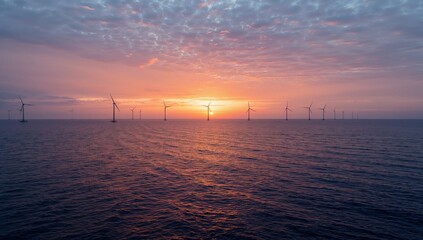 Stunning sunrise over ocean wind farm, promoting sustainable energy for a brighter future