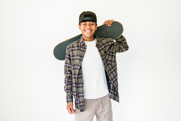 nice Boy with skateboards on studio white background