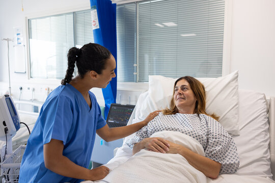 Nurse and patient interaction in a hospital room