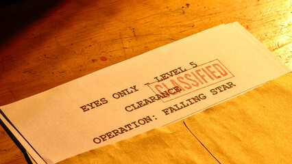 Close-up of a vintage-looking document, likely a classified security clearance, tucked into a tan...