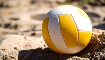 Volleyball on the sand close up shot.