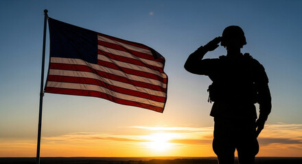 Photo of silhouette of a soldier saluting the american flag at sunset