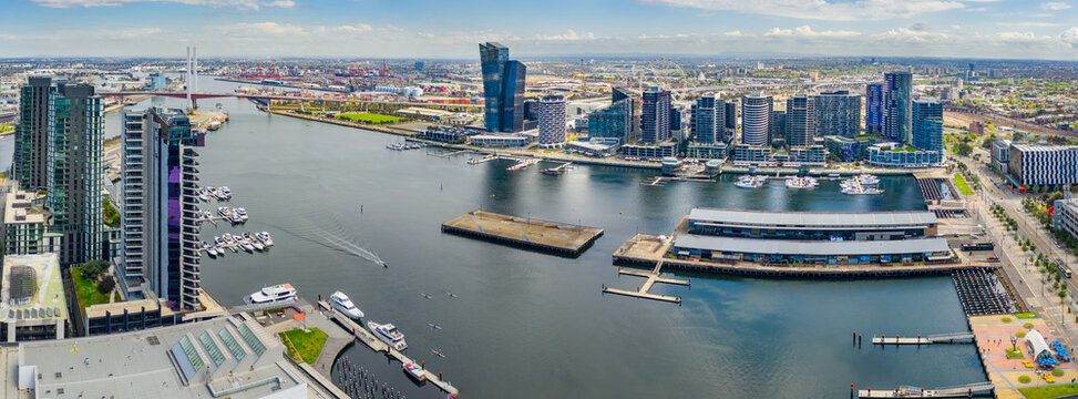 Aerial panorama of highrise buildings and piers at an inner city wharf at Docklands in Melbourne