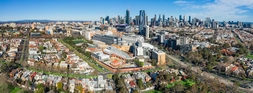 Aerial panorama of an inner city suburb with highrise buildings behind at North Melbourne