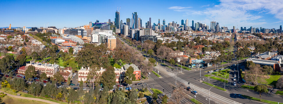 Aerial panorama of an inner city suburb with highrise buildings behind at North Melbourne