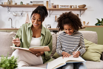 Cherished moments of learning between a mother and her daughter at home