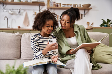 Cherishing moments at home with mother and daughter while sharing stories and laughter